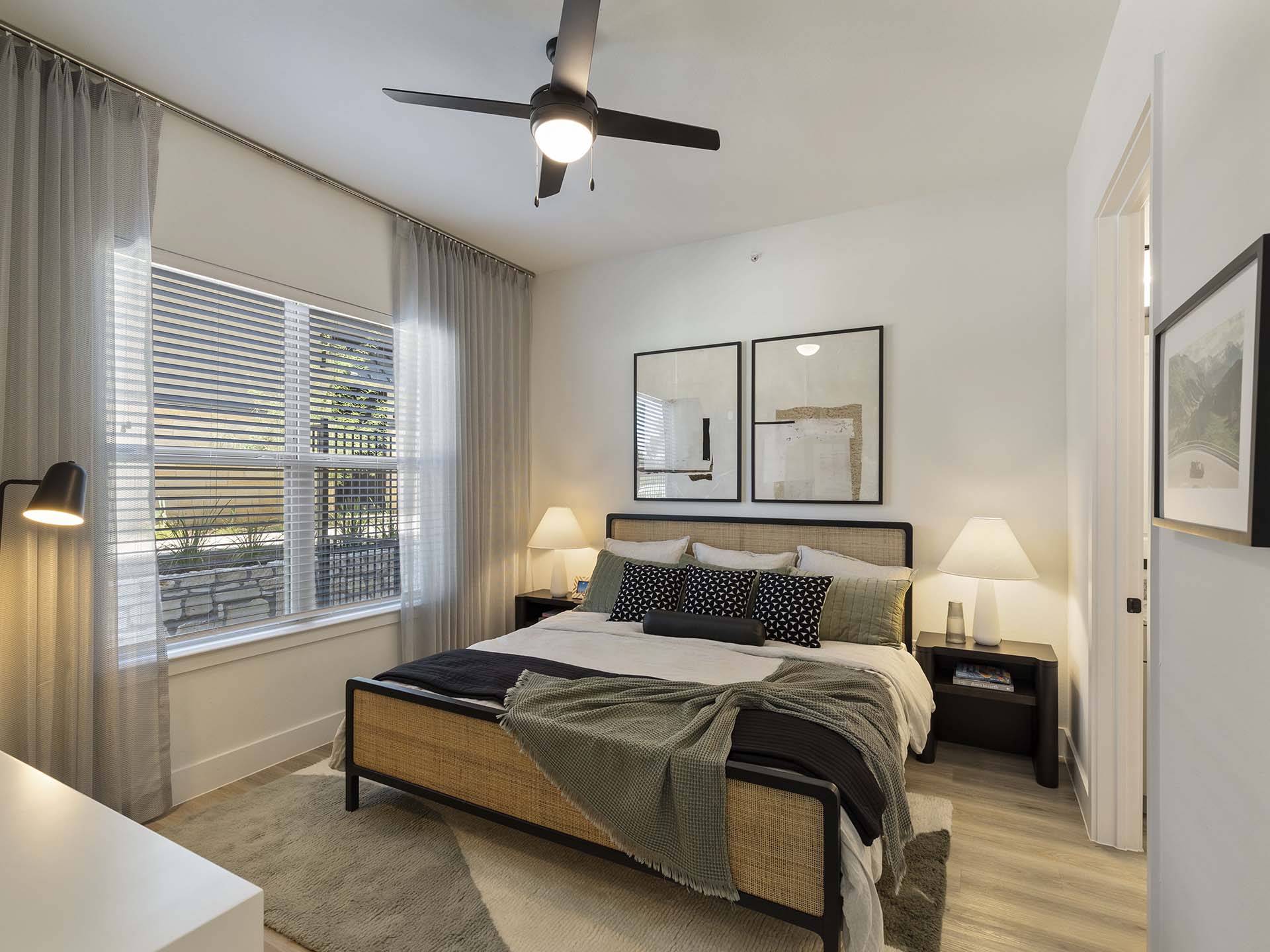 Furnished bedroom at The Evergrove apartments in Leander, TX
